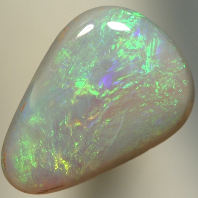 SOLID SEMI BLACK OPAL Greens and a touch of orange sparkle constantly